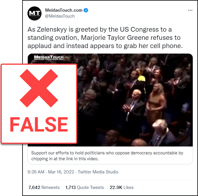 A tweet from MeidasTouch.com that says “As Zelenskyy is greeted by the US Congress to a standing ovation, Marjorie Taylor Greene refuses to applaud and instead appears to grab her cell phone.” The News Literacy Project has added a label that says, "FALSE."